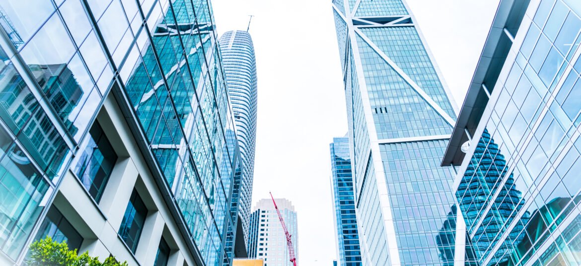 Modern,Financial,Business,District,Looking,Straight,Up,At,Rising,Towers